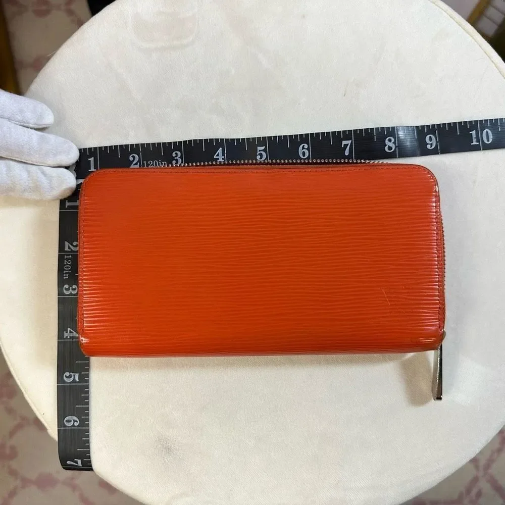 LOUIS VUITTON Long Wallet Epi Zippy Orange Women's Men's Leather